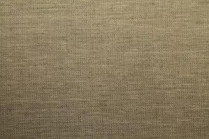 Natural linen material textile canvas Fabric texture background Close-up detail of fabric natural color Hemp material pattern design wallpaper. can be used as background or for graphic design photo