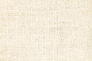Natural linen material textile canvas Fabric texture background Close-up detail of fabric natural color Hemp material pattern design wallpaper. can be used as background or for graphic design photo
