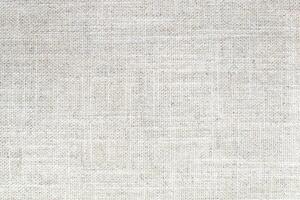 Natural linen material textile canvas Fabric texture background Close-up detail of fabric natural color Hemp material pattern design wallpaper. can be used as background or for graphic design photo