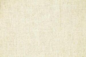Natural linen material textile canvas Fabric texture background Close-up detail of fabric natural color Hemp material pattern design wallpaper. can be used as background or for graphic design photo