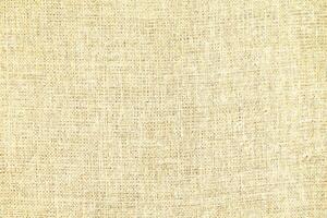 Natural linen material textile canvas Fabric texture background Close-up detail of fabric natural color Hemp material pattern design wallpaper. can be used as background or for graphic design photo