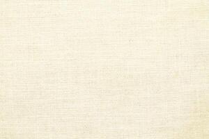 Natural linen material textile canvas Fabric texture background Close-up detail of fabric natural color Hemp material pattern design wallpaper. can be used as background or for graphic design photo