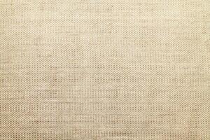 Natural linen material textile canvas Fabric texture background Close-up detail of fabric natural color Hemp material pattern design wallpaper. can be used as background or for graphic design photo
