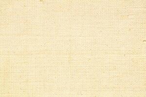 Natural linen material textile canvas Fabric texture background Close-up detail of fabric natural color Hemp material pattern design wallpaper. can be used as background or for graphic design photo