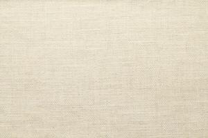 Natural linen material textile canvas Fabric texture background Close-up detail of fabric natural color Hemp material pattern design wallpaper. can be used as background or for graphic design photo