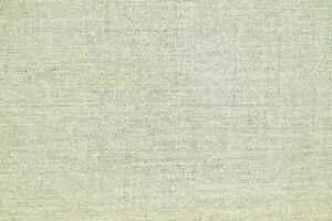 Natural linen material textile canvas Fabric texture background Close-up detail of fabric natural color Hemp material pattern design wallpaper. can be used as background or for graphic design photo
