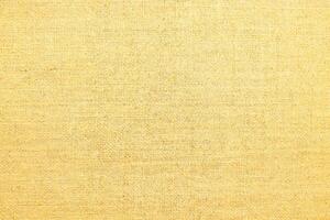 Natural linen material textile canvas Fabric texture background Close-up detail of fabric natural color Hemp material pattern design wallpaper. can be used as background or for graphic design photo