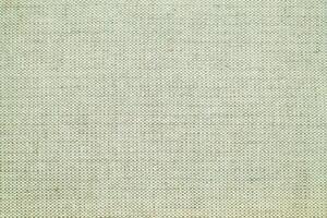 Natural linen material textile canvas Fabric texture background Close-up detail of fabric natural color Hemp material pattern design wallpaper. can be used as background or for graphic design photo
