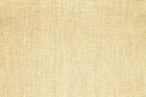Natural linen material textile canvas Fabric texture background Close-up detail of fabric natural color Hemp material pattern design wallpaper. can be used as background or for graphic design photo