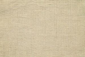Natural linen material textile canvas Fabric texture background Close-up detail of fabric natural color Hemp material pattern design wallpaper. can be used as background or for graphic design photo