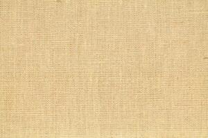 Natural linen material textile canvas Fabric texture background Close-up detail of fabric natural color Hemp material pattern design wallpaper. can be used as background or for graphic design photo