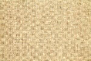 Natural linen material textile canvas Fabric texture background Close-up detail of fabric natural color Hemp material pattern design wallpaper. can be used as background or for graphic design photo
