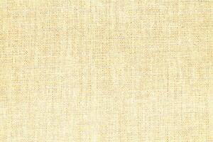 Natural linen material textile canvas Fabric texture background Close-up detail of fabric natural color Hemp material pattern design wallpaper. can be used as background or for graphic design photo