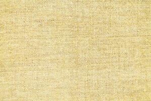 Natural linen material textile canvas Fabric texture background Close-up detail of fabric natural color Hemp material pattern design wallpaper. can be used as background or for graphic design photo