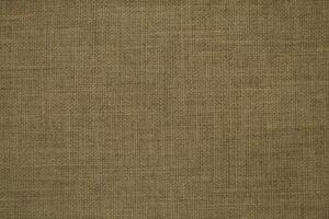 Natural linen material textile canvas Fabric texture background Close-up detail of fabric natural color Hemp material pattern design wallpaper. can be used as background or for graphic design photo
