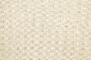 Natural linen material textile canvas Fabric texture background Close-up detail of fabric natural color Hemp material pattern design wallpaper. can be used as background or for graphic design photo