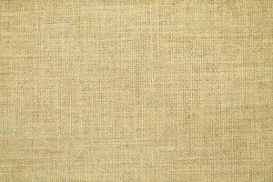 Natural linen material textile canvas Fabric texture background Close-up detail of fabric natural color Hemp material pattern design wallpaper. can be used as background or for graphic design photo