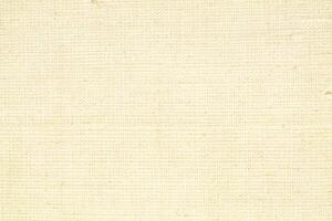 Natural linen material textile canvas Fabric texture background Close-up detail of fabric natural color Hemp material pattern design wallpaper. can be used as background or for graphic design photo