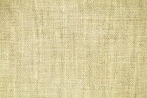Natural linen material textile canvas Fabric texture background Close-up detail of fabric natural color Hemp material pattern design wallpaper. can be used as background or for graphic design photo