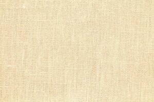 Natural linen material textile canvas Fabric texture background Close-up detail of fabric natural color Hemp material pattern design wallpaper. can be used as background or for graphic design photo