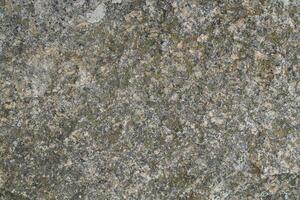 Abstract natural rock stone granite grunge rusty metal texture design background natural color stone material granite design wallpaper. Close-up detail of natural stone photo