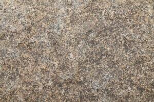 Abstract natural rock stone granite grunge rusty metal texture design background natural color stone material granite design wallpaper. Close-up detail of natural stone photo