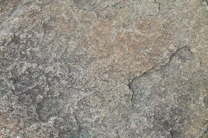 Abstract natural rock stone granite grunge rusty metal texture design background natural color stone material granite design wallpaper. Close-up detail of natural stone photo