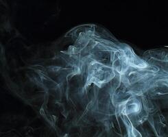 Abstract white smoke texture moves on black background Plume of smoke wave design wallpaper. Design element. Abstract texture photo