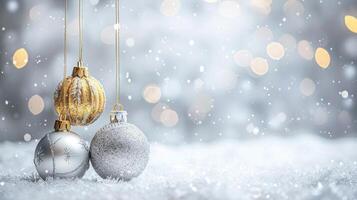 Beautiful background of gold and silver Christmas decorations. A festive atmosphere. Hanging decorations on a background of soft white texture of snow. A place for the text. photo