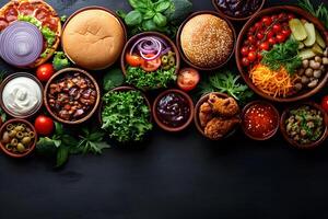 Delicious Assortment of Fast Food Ingredients and Burgers for Culinary Creations photo
