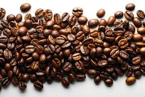 Roasted Coffee Beans on White Surface - Ideal for Print, Card, Poster, and Coffee-Related Designs photo