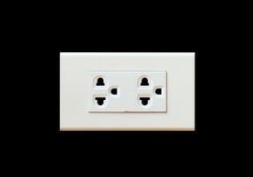Close-Up of a Modern Electrical Outlet on a Black Background for Home and Office Use photo