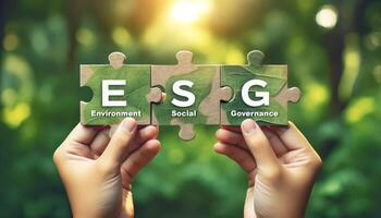 Hands holding puzzle pieces with ESG letters representing Environment, Social, and Governance in a green forest background. photo