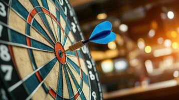 A close-up of a dartboard with a blue dart hitting the bullseye, symbolizing precision and focus in a lively environment. photo