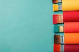 A vibrant arrangement of paint brushes on a colorful background, perfect for art and creativity themes. photo