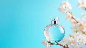 Elegant perfume bottle with a soft blue background and delicate flowers, perfect for beauty and fragrance themes. photo