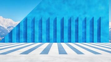 Vibrant blue wall with geometric patterns and shadows, set against a scenic mountain backdrop, creating a striking visual contrast. photo