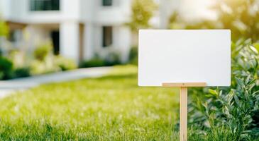 A blank wooden signpost in a green garden setting, perfect for customization or signage in outdoor spaces. photo
