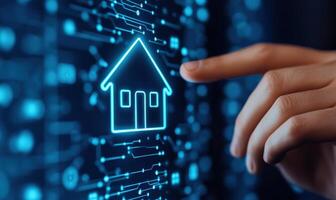 A hand interacting with a digital home icon on a futuristic interface, representing smart home technology. photo