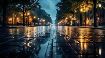 Wet cobblestone street after rain with streetlights reflecting in puddles at night. photo