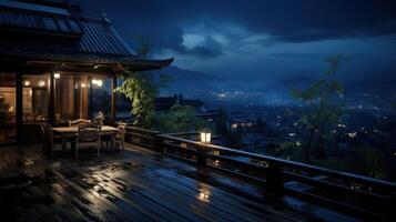 Wet wooden balcony with a view of a city at night. photo