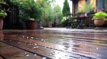 Wet wooden patio with raindrops. photo