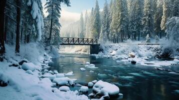 A wooden bridge crossing a snow-covered river with pine trees and a snowy forest in the background. photo