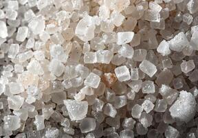 Extreme close-up of the granular texture of sea salt crystals photo