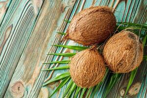 fresh natural coconut on rustik wooden background photo