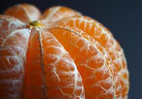 Zoomed-in view of the fibrous texture of a peeled orange photo