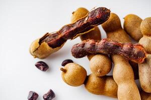 sweet and sour tamarind on a white background photo