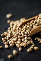 natural hemp seed on black stone background photo