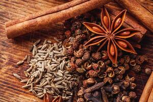 aromatic Chinese five spices on a dark rustic background photo