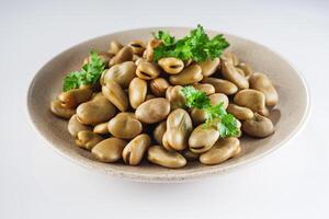 delicious Turkish snack boiled broad beans fava photo